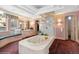 Elegant bathroom featuring a jetted tub and double vanity at 1682 Montane E Dr, Golden, CO 80401