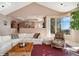 Open living area with sectional sofa, offering scenic views at 1682 Montane E Dr, Golden, CO 80401