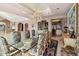 Elegant dining room with a glass table and chandelier at 1682 Montane E Dr, Golden, CO 80401