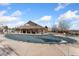 Community pool with a cover, adjacent to a clubhouse at 12348 W Dorado Pl # 302, Littleton, CO 80127