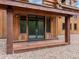 Inviting covered entry with double doors leading into the home at 733 Rainbow Rd, Idaho Springs, CO 80452