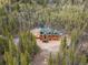 Luxury log home nestled in a beautiful mountain setting with stunning views at 733 Rainbow Rd, Idaho Springs, CO 80452