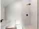 Clean bathroom with toilet, sink, and walk-in shower at 733 Rainbow Rd, Idaho Springs, CO 80452
