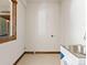 Laundry room with stainless steel sink and ample space at 733 Rainbow Rd, Idaho Springs, CO 80452