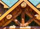 Close-up of log cabin exterior with unique wood detailing at 733 Rainbow Rd, Idaho Springs, CO 80452