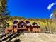 Log home nestled in a mountain setting with stunning views at 733 Rainbow Rd, Idaho Springs, CO 80452