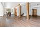 Finished basement with wood floors, multiple rooms, and large windows at 733 Rainbow Rd, Idaho Springs, CO 80452