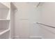 Large walk-in closet with shelving and hanging rod at 555 E 10Th Ave # 3, Denver, CO 80203