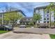 Modern condo building with ample parking and landscaping at 555 E 10Th Ave # 3, Denver, CO 80203