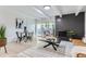 Open concept living room with dining area and fireplace at 555 E 10Th Ave # 3, Denver, CO 80203