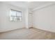 Simple bedroom with carpet, window, and closet at 5694 Pinto Valley St, Parker, CO 80134