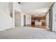 Open concept living room with views into the kitchen and dining area at 5694 Pinto Valley St, Parker, CO 80134