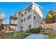 Two-story home with gray siding and deck at 10217 Lauren Ct, Highlands Ranch, CO 80130