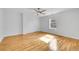 Well-lit bedroom with hardwood floors and ceiling fan at 1431 Tamarac St, Denver, CO 80220