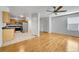 Kitchen with light wood cabinets and stainless steel appliances at 1431 Tamarac St, Denver, CO 80220