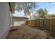Landscaped backyard with patio and wood fence at 1431 Tamarac St, Denver, CO 80220
