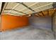 Empty garage with painted walls and concrete floor at 1431 Tamarac St, Denver, CO 80220