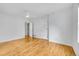 Bright bedroom with hardwood floors and ceiling fan at 1431 Tamarac St, Denver, CO 80220