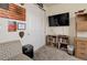 Cozy media room with comfortable seating and a large TV at 8901 S Ukraine Ct, Aurora, CO 80016