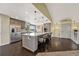 Modern kitchen with stainless steel appliances and island at 2460 Eileen Way, Parker, CO 80138