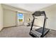 Spacious exercise room with treadmill and stationary bike at 2460 Eileen Way, Parker, CO 80138