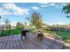 Spacious deck with seating area overlooking a beautiful backyard at 2460 Eileen Way, Parker, CO 80138