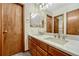 Double vanity bathroom with modern finishes at 2460 Eileen Way, Parker, CO 80138