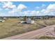 Aerial view of house, barn, and expansive land at 2460 Eileen Way, Parker, CO 80138