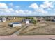 Aerial view showing house, barn, and surrounding landscape at 2460 Eileen Way, Parker, CO 80138