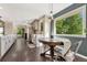 Eat-in kitchen with farmhouse table and view at 2460 Eileen Way, Parker, CO 80138