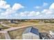 Aerial view of property showing house, detached garage, and surrounding landscape at 2460 Eileen Way, Parker, CO 80138