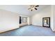 Spacious bedroom with vaulted ceilings and large window at 6474 Lone Eagle Rd, Golden, CO 80403