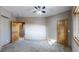 Cozy basement bedroom with wood doors at 6474 Lone Eagle Rd, Golden, CO 80403