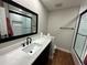 Clean bathroom with single vanity and shower/tub at 10051 E Walsh Pl, Denver, CO 80247