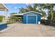 Detached garage with concrete flooring and automatic door opener at 1100 S Quitman St, Denver, CO 80219