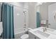 Clean bathroom with white subway tile and bathtub at 1192 Lost Elk Loop, Castle Rock, CO 80108