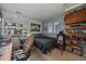 Cozy bedroom with built-in shelving and a comfortable bed at 2181 S Victor St # D, Aurora, CO 80014