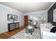 Bright living room with hardwood floors and neutral decor at 2438 W 35Th Ave # 2, Denver, CO 80211