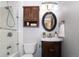 Updated bathroom with white tile and a modern vanity at 2438 W 35Th Ave # 2, Denver, CO 80211