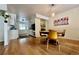 Open concept kitchen and dining area with hardwood floors at 3240 Folsom St, Boulder, CO 80304