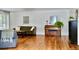 Living room with hardwood floors, comfortable seating and a piano at 3240 Folsom St, Boulder, CO 80304