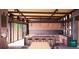 Modern kitchen with sleek cabinetry, large island, and open layout at 7 Canyon Pines Dr, Arvada, CO 80403