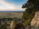 Scenic overlook of a vast landscape with a road and city in distance at 7 Canyon Pines Dr, Arvada, CO 80403