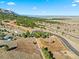 Aerial view of property, showing roads and surrounding landscape at 7 Canyon Pines Dr, Arvada, CO 80403