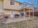 Back patio with access to deck and grill at 2450 S Deframe St, Lakewood, CO 80228