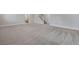 Unfinished basement with neutral carpeting and plenty of space at 13351 E 100Th Pl, Commerce City, CO 80022