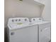 Laundry room with side-by-side washer and dryer at 13351 E 100Th Pl, Commerce City, CO 80022