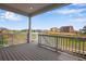 Spacious deck overlooks the backyard and surrounding neighborhood at 13351 E 100Th Pl, Commerce City, CO 80022