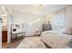 Charming bedroom with a vanity and ample closet space at 2394 S Loveland Way, Lakewood, CO 80228