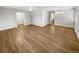 Hardwood floor living room with access to other rooms at 746 S Poplar St, Denver, CO 80224